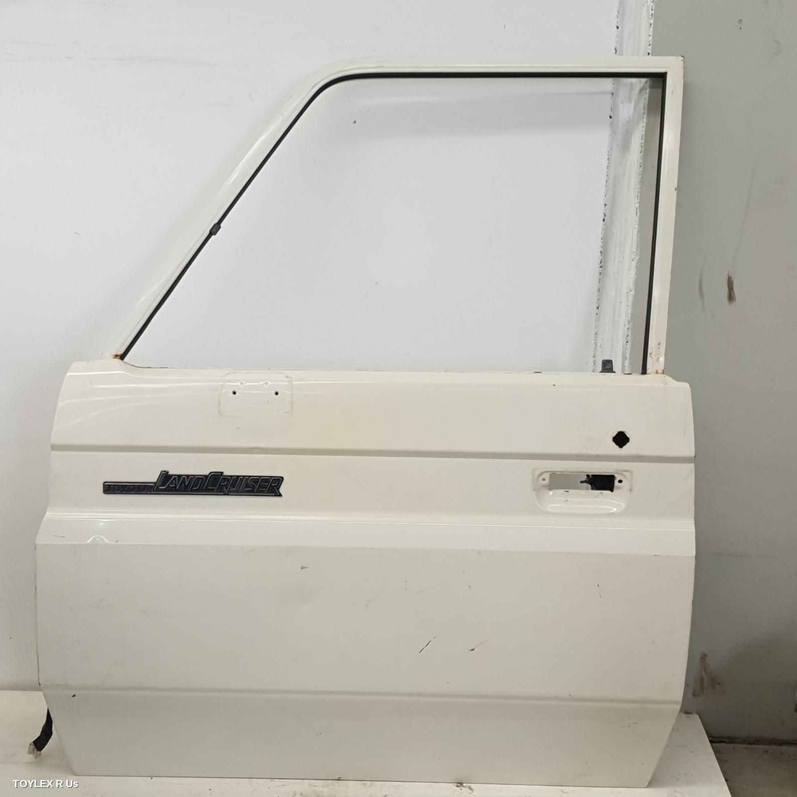 TOYOTA LANDCRUISER 2003 Left Front Door 78/79 SERIES, NON POWER DOOR LOCK TYPE