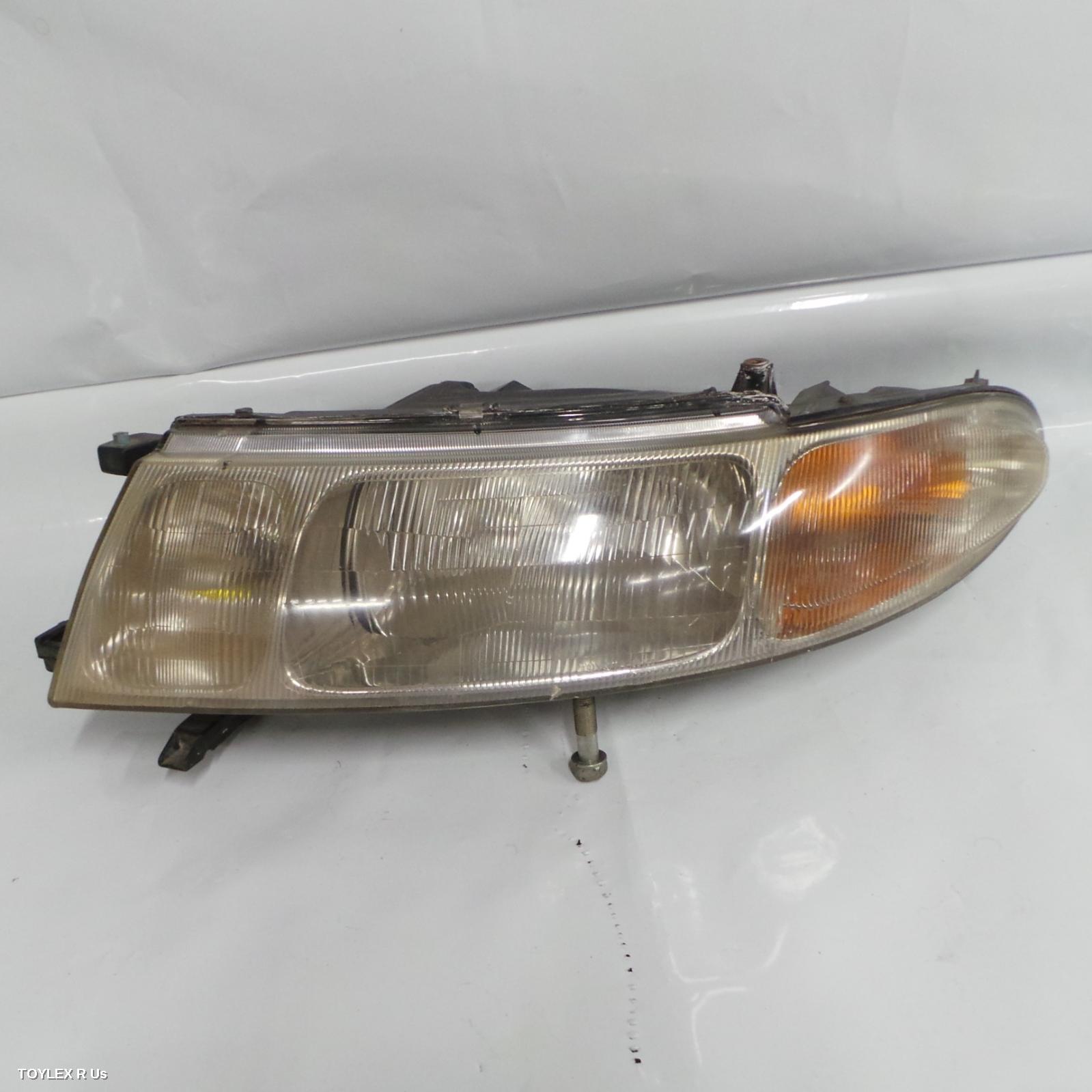 TOYOTA ESTIMA 1995 Left Headlamp KOITO LENS# 28-100, 94-96 (IMPORT)