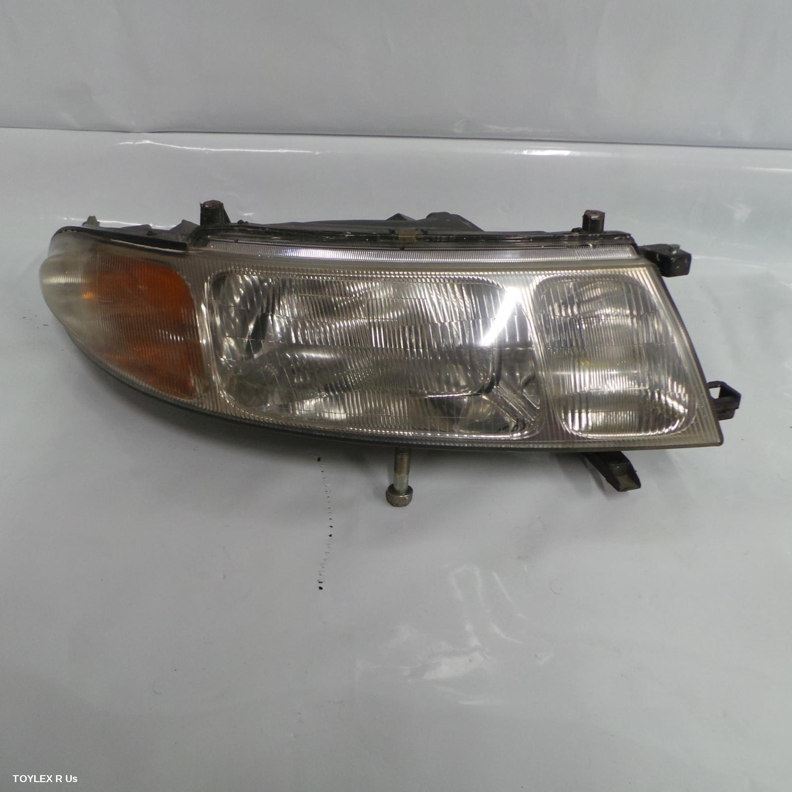 TOYOTA ESTIMA 1996 Right Headlamp KOITO LENS# 28-100, 94-96 (IMPORT)