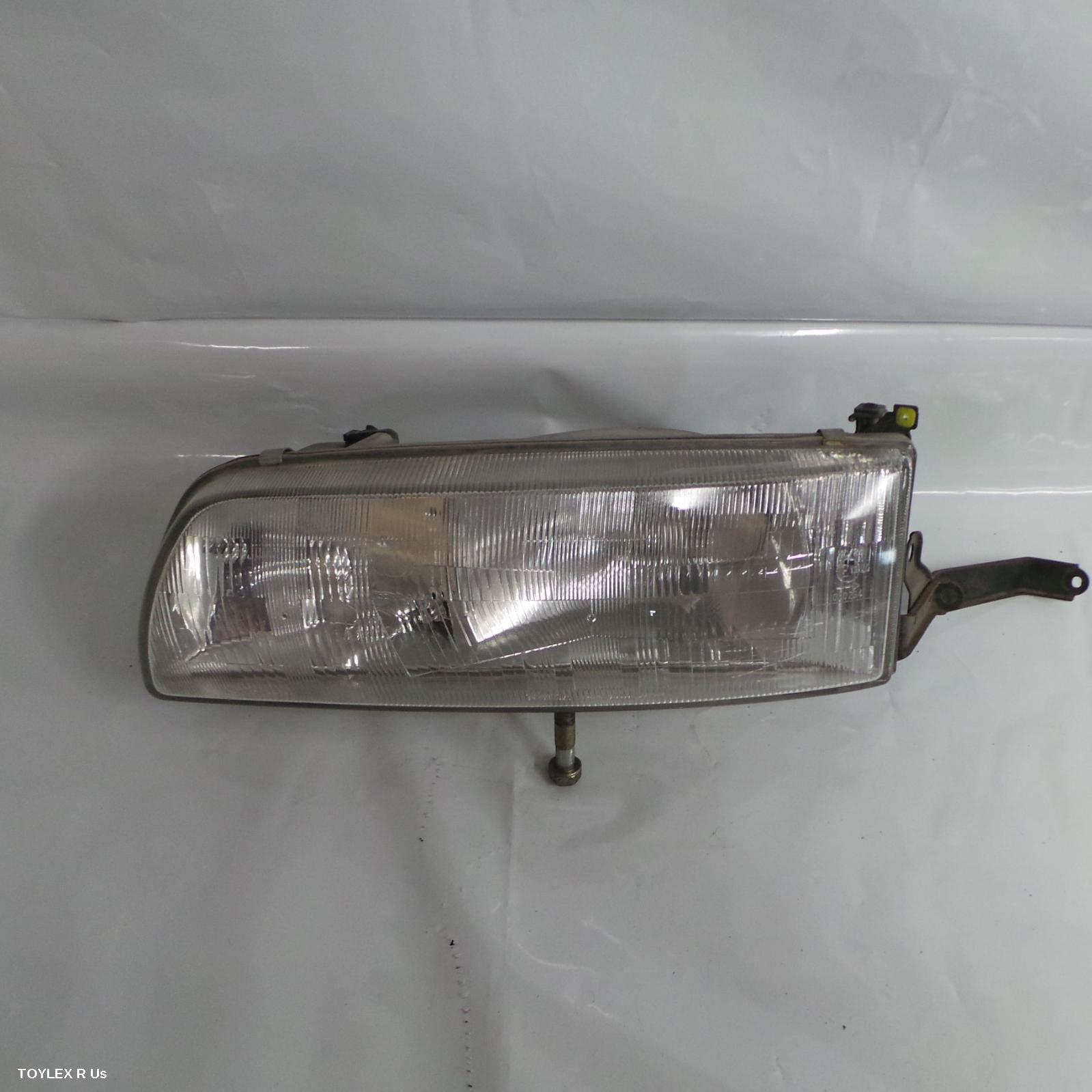 TOYOTA TARAGO 1998 Left Headlamp TCR10, W/O D/LIGHT, 09/90-05/00 8117028352