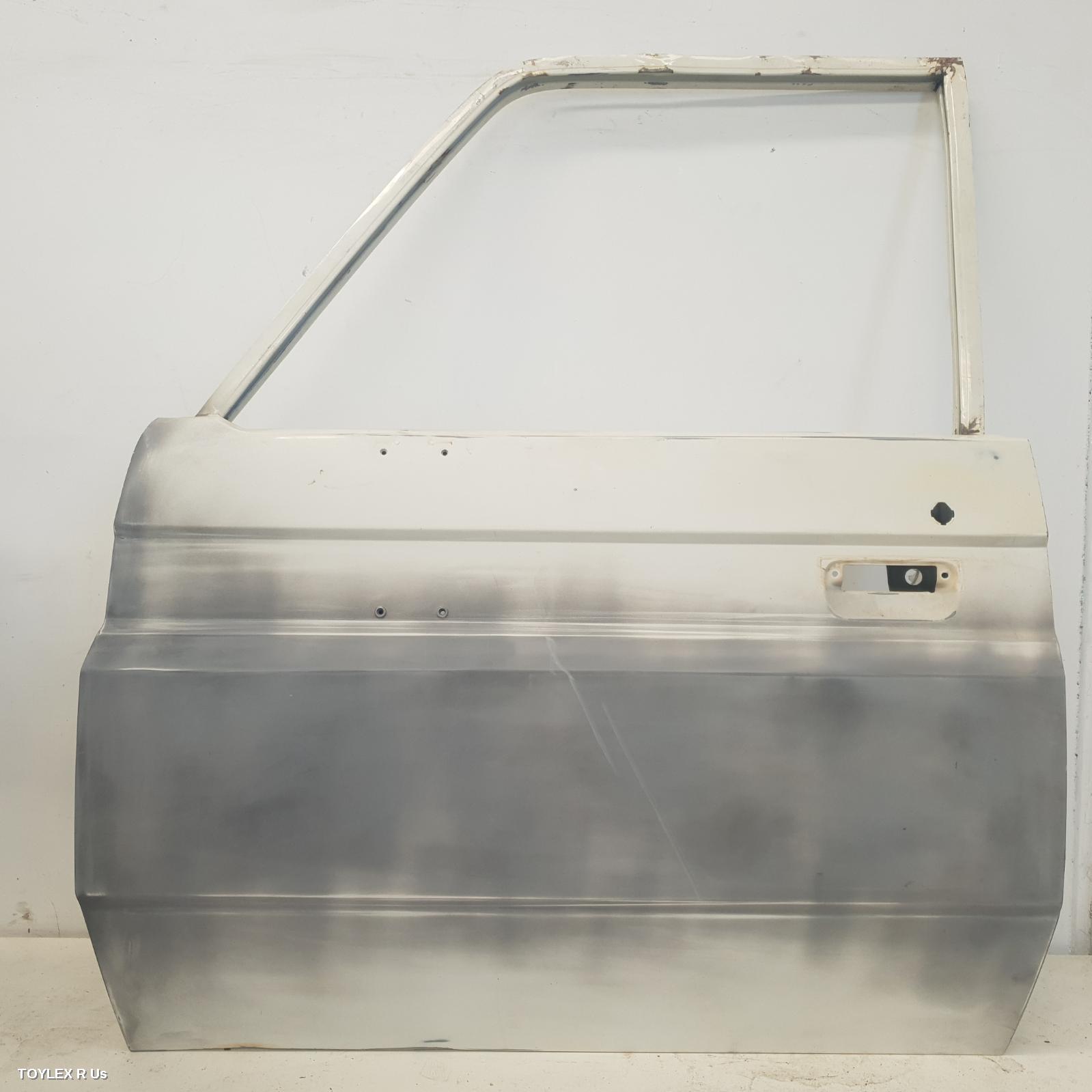 TOYOTA LANDCRUISER 2003 Left Front Door 78/79 SERIES, NON POWER DOOR LOCK TYPE