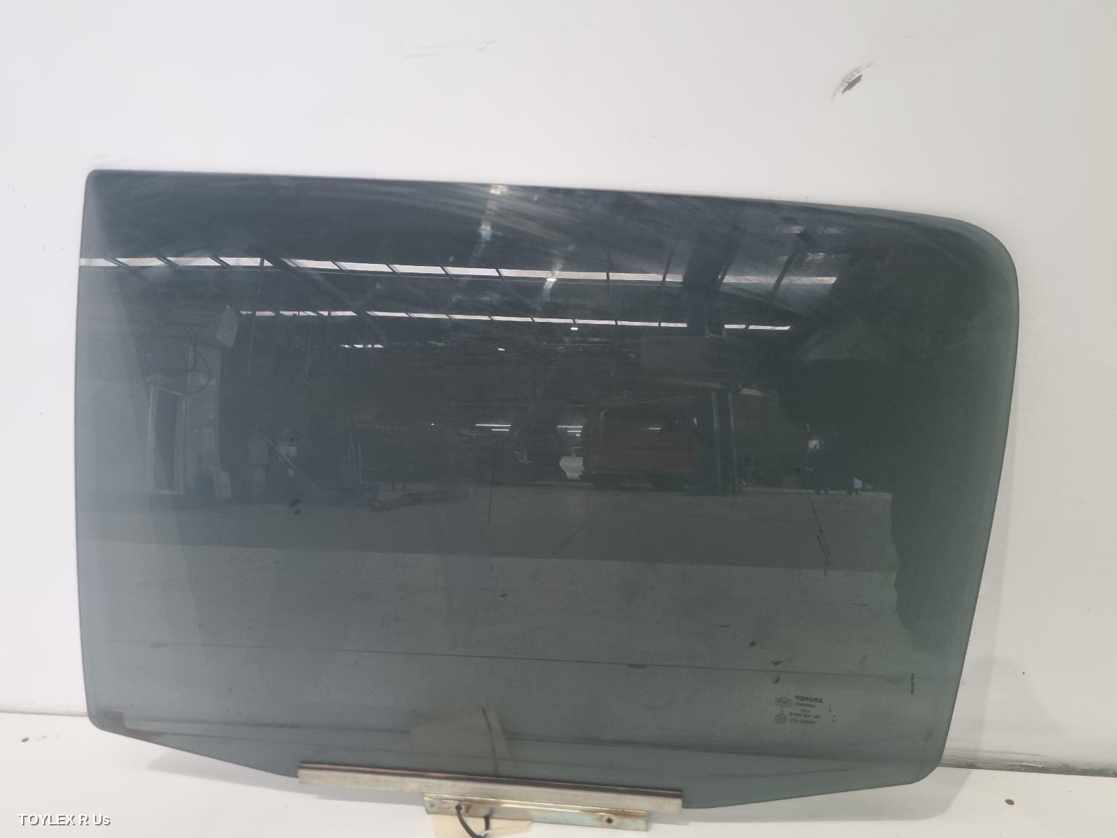 TOYOTA HILUX 2014 Left Rear Door Window DARK TINT TYPE